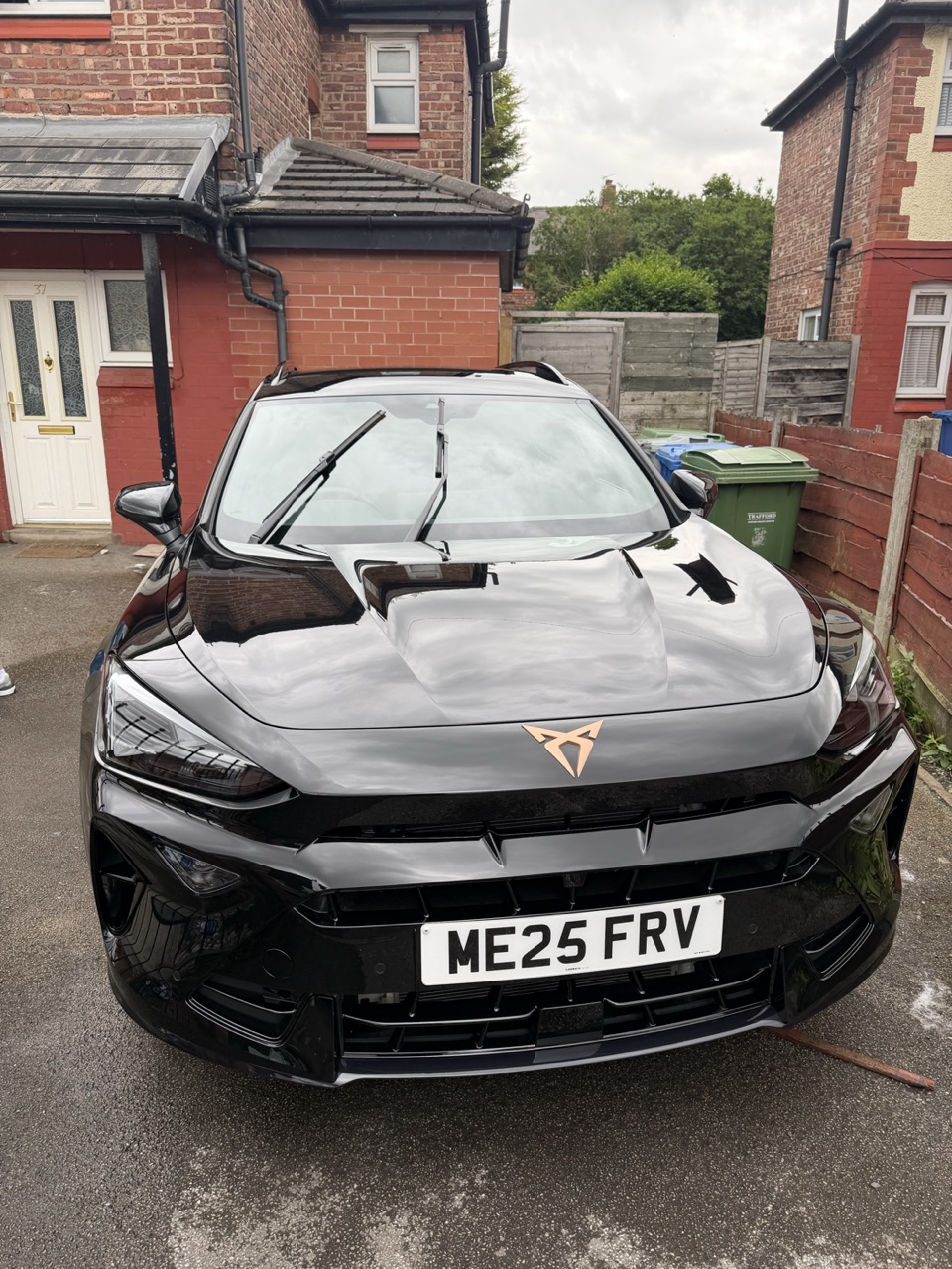 A black Cupra SUV with a showroom shine after a DR Elite valet